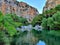 Lake in the mountain area surrounded by vegetation

ï¿¼