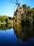 Lake and mountain in Buttes Chaumont park in Paris