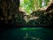 Lake in a mountain gorge in the cave in the tropical jungle of the Philippines