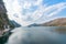 Lake and mountain range with cloudy sky in summer. Vajiralongkorn Dam, Kanchanaburi, Thailand