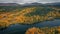 Lake and mountains with trees in autumn along the scenic Wilderness Road in Jämtland in Sweden from above