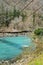 Lake in the mountains in winter. picturesque natural mountainous landscape with a reservoir.