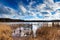 Lake with old destroyed pier