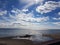 Lake Ontario Beach under Bright Clouds