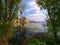 Lake Orestiada  and Kastoria city, Greece, view through trees. Picturesque landscape photo