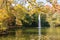 Lake or pond in the garden with water jet in autumn. Campo Grande, Valladolid, Castile and Leon, Spain