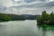 Lake pristine with forest water reflection at morning