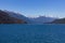 Lake Puelo with distant snow-caped mountains