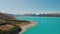 Lake Pukaki, Mount Cook with blue sky with and snow covered Southern Alps, New Zealand