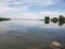 Lake reflecting clouds reeds