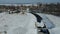 Lake and river frozen dam in winter, aerial view