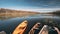 Lake or river and old rowing fishing boats in beautiful autumn sunny day