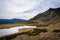 A lake on a rocky mountain landscape on Guadarrama mountain range, PeÃ±alara, Madrid, Spain