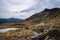 A lake on a rocky mountain landscape on Guadarrama mountain range, PeÃ±alara, Madrid, Spain