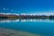 Lake Ruataniwha, New Zealand, South Island, trees and mountains, azure water reflections