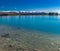 Lake Ruataniwha, New Zealand, South Island, trees and mountains, azure water reflections