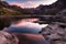 Lake Sabrina reflecting sunset skies of coral pink