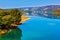 Lake Sainte-Croix-du-Verdon reflects wooded shore