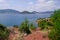 Lake Salagou french Lac wide red sand calm water and colorful hills in south france