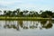 Lake, sand traps, palm trees & golf