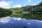 Lake Santo, Lago Santo across the mountains and woods. Nature reflects on the surface of the lake. Lagdei, Emilia-Romagna