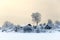 Lake shore with timber houses at winter season with sunset sky