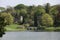 The lake in Spring at Stourhead - Palladian Bridge and church