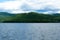 Lake Squam water from boat with view of island and mountains