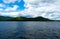 Lake Squam water from boat with view of island and mountains