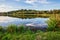 Lake at sunset. Countryside rural scenery in Poland