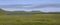 Lake and swampy valley in the tundra against the background of t