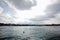 Lake in Swiss mountains, fog on sunrise time, near Geneva, blue sky