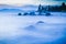 Lake Tahoe boulders appear floating in fog