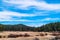 Lake Tahoe California Dry Landscape with Thick Forests and Blue Skies above Horizon