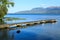 Lake Tarawera pier, New Zealand, with Mount Tarawera in the background