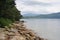 Lake Tazawa with a mountain range on the opposite shore on a cloudy day in Akita prefecture, Tohoku region in northern Japan