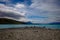 Lake Tekapo bright blue from the village shore