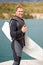 Lake, thumbs up and portrait of man with wakeboard for surfing, exercise and hobby outdoors. Fitness, extreme sports and