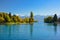 Lake Thun with Jungfrau mountain in autumn on clear blue sky , S