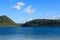 Lake Tikitapu near Rotorua, New Zealand, surrounded by forested hills