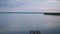 lake tranquility. a small wave on the water. soft light from the setting sun. beautiful places of the planet