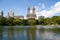 Lake and trees at Central Park and buildings in Manhattan