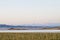 Lake Tuzkol in Kazakhstan and a view of Khan Tengri peak at sunrise