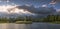 The Lake under The Peaks at Sunset