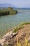 Lake vegetation and clear waters in San Biagio island, Manerba del garda, Italy