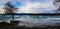 Lake Villarrica and volcano, covered in snow.