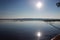 Lake Vysokinskoye in the summer, with the reflection of white clouds in the water. early quiet morning. smooth surface of water. L