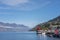 Lake Wakatipu view down lake to converging mountains past Steamer Wharf and historic Earnslaw ship