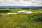 A lake in wetlands around a stunted forest not far from Okhotsk sea seashore