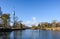 Lake with white birds in danube park at financial district Vienna